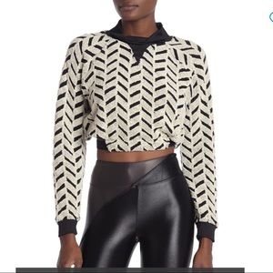 Koral Echo Frilly Pullover-Fits size XS or S